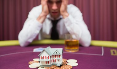 Man is betting his house at poker game in casino