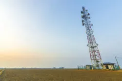 Telecommunication towers on an agricultural field