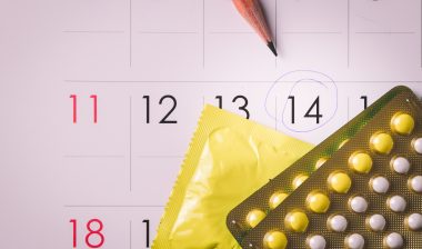 Birth control pills on calendar