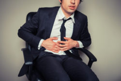 hernia mesh complications man with stomach pain