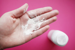 baby powder talcum powder talc in hand