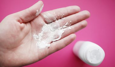 baby powder talcum powder talc in hand