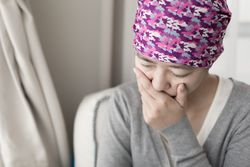 poor cancer woman feel bad at home