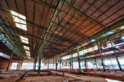 Ruins of a very polluted industrial factory abandoned with asbestos waste carcinogens