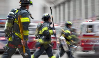 fire trucks and firefighters brigade in the city