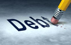 Erasing debt concept with a pencil and eraser eliminating the icon for owing money in credit cards or car payments and mortgages and managing a solution out of bankrupcy and into financial success.
