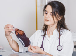 Xarelto bleeding transfusion doctor with blood pouch