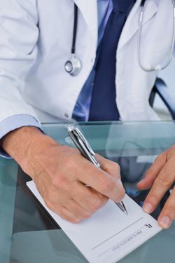 opioid addiction opi9oid crisis doctor writing prescription