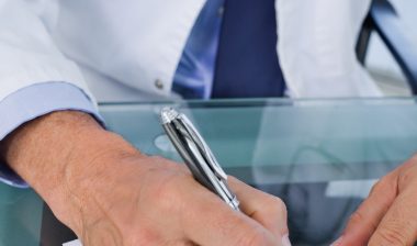 opioid addiction opi9oid crisis doctor writing prescription