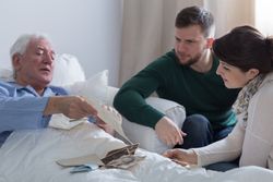 Xarelto bleeding family visiting man in hospital
