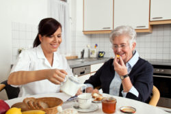 Home Helpers home health care worker and patient