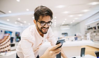 0% interest store credit card man shopping for phone
