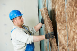 asbestos mesothelioma man installing insulation
