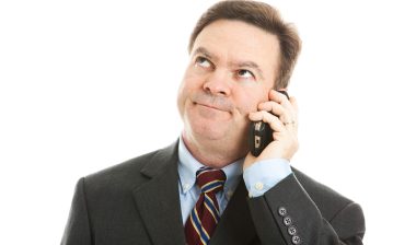 TCPA robocalls telemarketing man rolling eyes on phone
