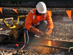 Rail welder using oxy torch to cut through rail