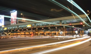 toll road violation fines toll booth at night