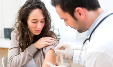 Zostavax vaccine woman getting vaccination