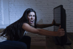 Samsung plasma television woman holding TV