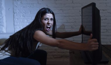 Samsung plasma television woman holding TV