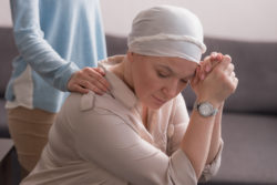 Taxotere hair loss alopecia woman with head scarf