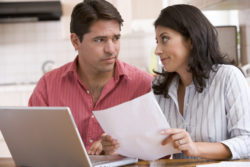 New York debt collection FDCPA couple reading bills