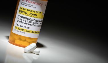 Prescription hydrocodone pills illustrating opioid overdose death epidemic