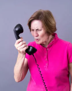woman angry at receiving Synchrony Robocalls