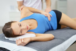 woman getting physical therapy after Biomet hip replacement problems