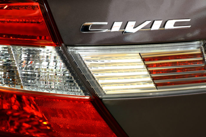 close up of honda civic logo
