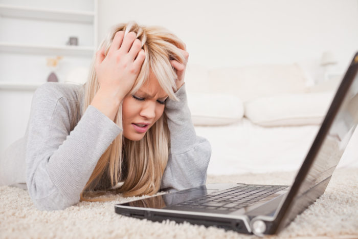 woman trying to connect to the internet using an ARRIS cable modem