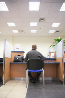 man in bank office for TD Bank Account