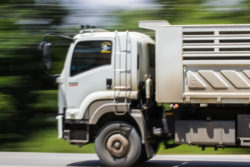 truck driving down road leads to 18 wheeler accident