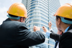 businessmen expose workers to asbestos
