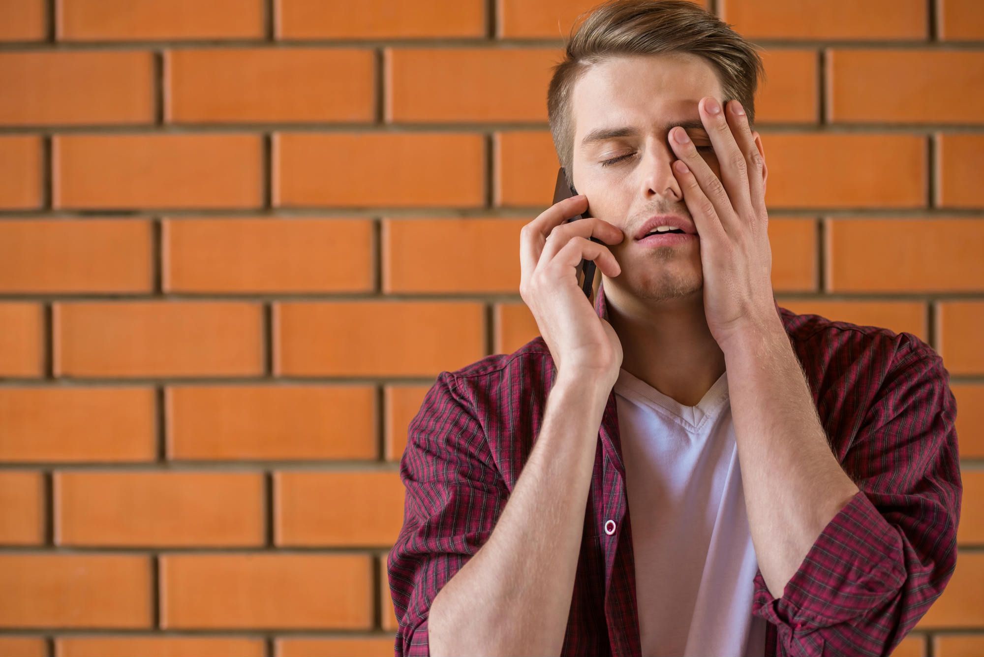 man frustrated by Wells Fargo robocalls