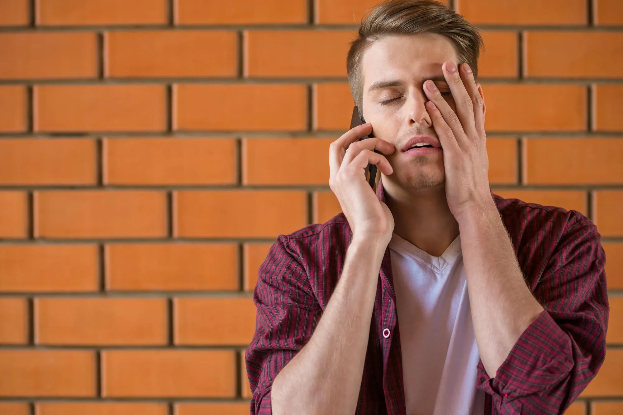 man frustrated by Wells Fargo robocalls