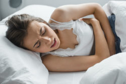 woman suffering pain from Essure coils
