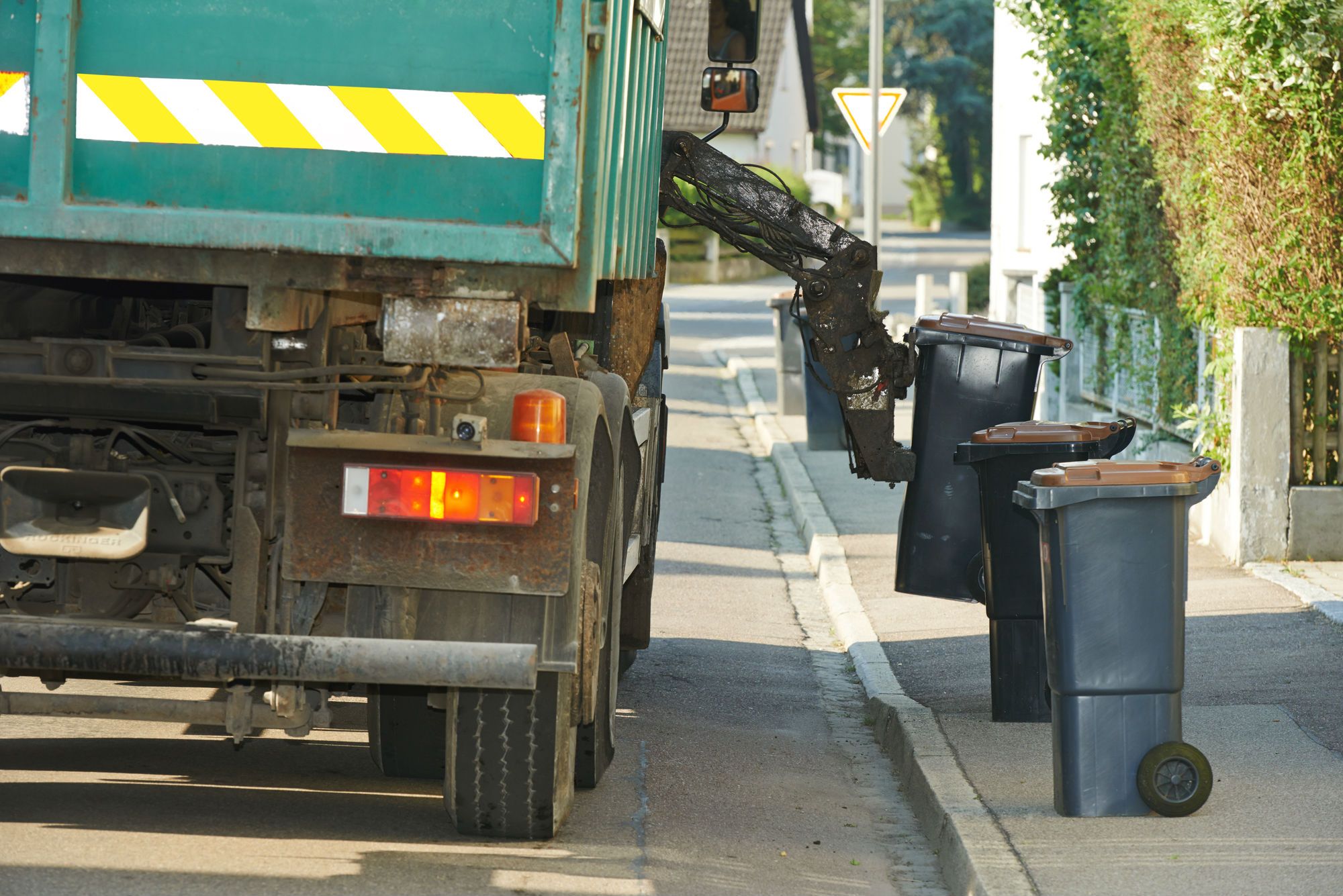 Waste Management Workers Allege Company Didn't Provide Overtime Pay