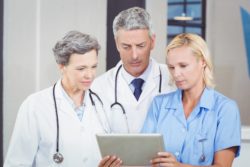 doctors looking at image of IVC filter migration