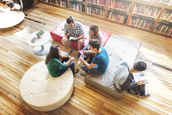 Temple University students studying together in library
