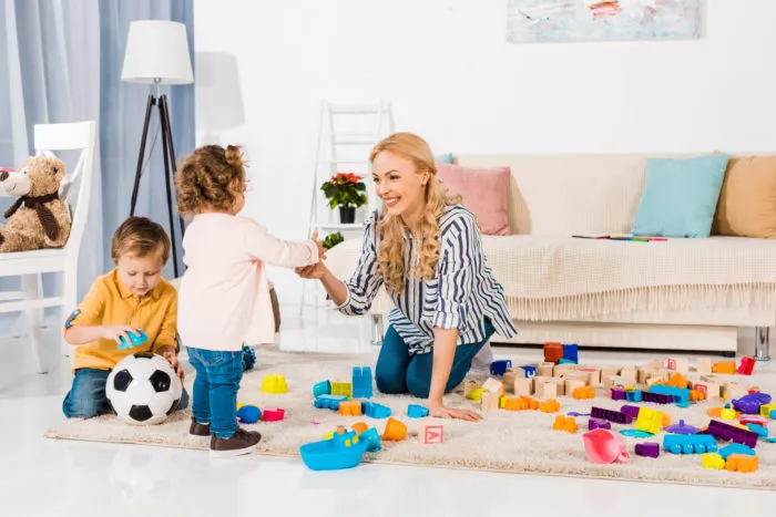 au pair interacting with kids