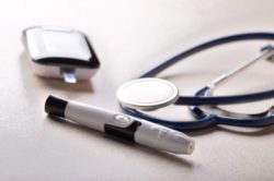 Stethoscope and diabetes lancet