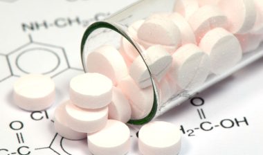 Antibiotics spilling from jar