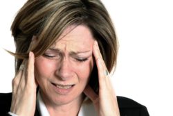 woman with headaches sues Unum for disability