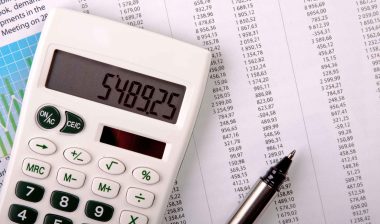 calculator on accounting sheet