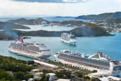 Three cruise ships in a harbor