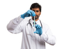 A doctor prepares a vaccine.