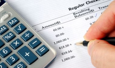 person checking bank statement