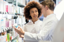 Pharmacists discussing a drug.