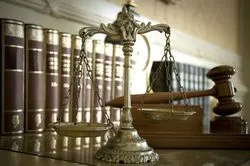 A set of scales, a gavel, and some law books