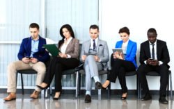 Job applicants wait to be interviewed.